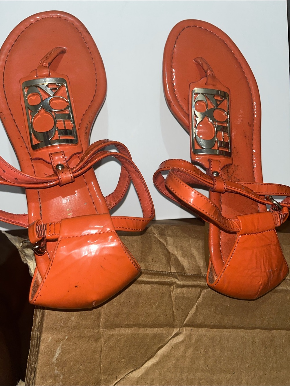 Coach Orange Patent Leather T-Strap Sandals with Logo Accent